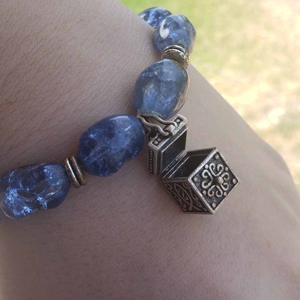 Cracked glass with box charm